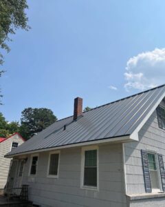 metal roof on gray home