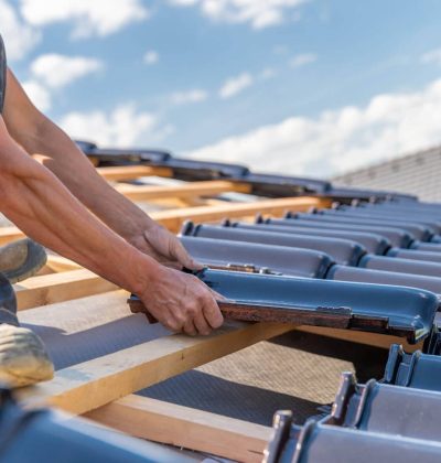 professional installing metal roof